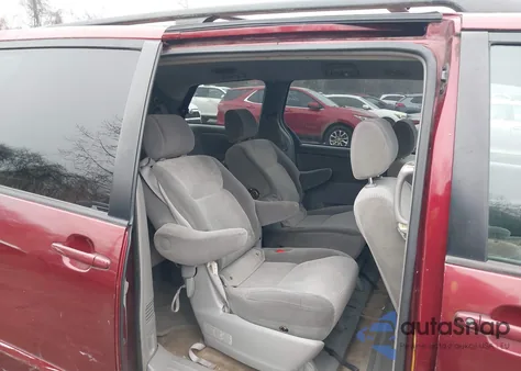 2007 Toyota Sienna Le z USA, uszkodzony, nr VIN 5TDZK23C27S049971